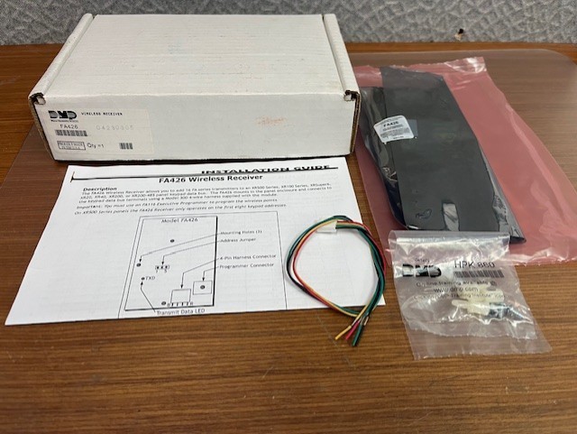 DMP FA426 wireless receiver; NOS. New with accessories