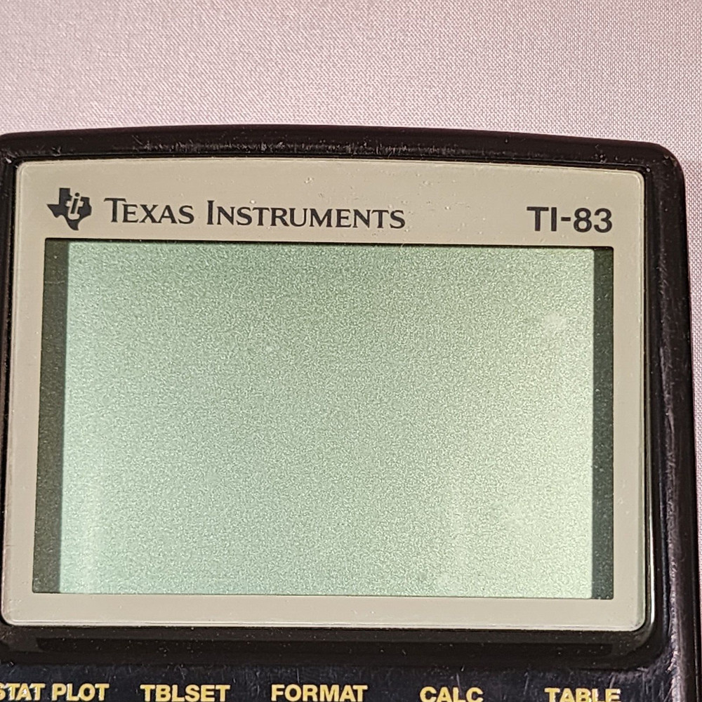Texas Instruments TI-83 Graphing Calculator With Cover