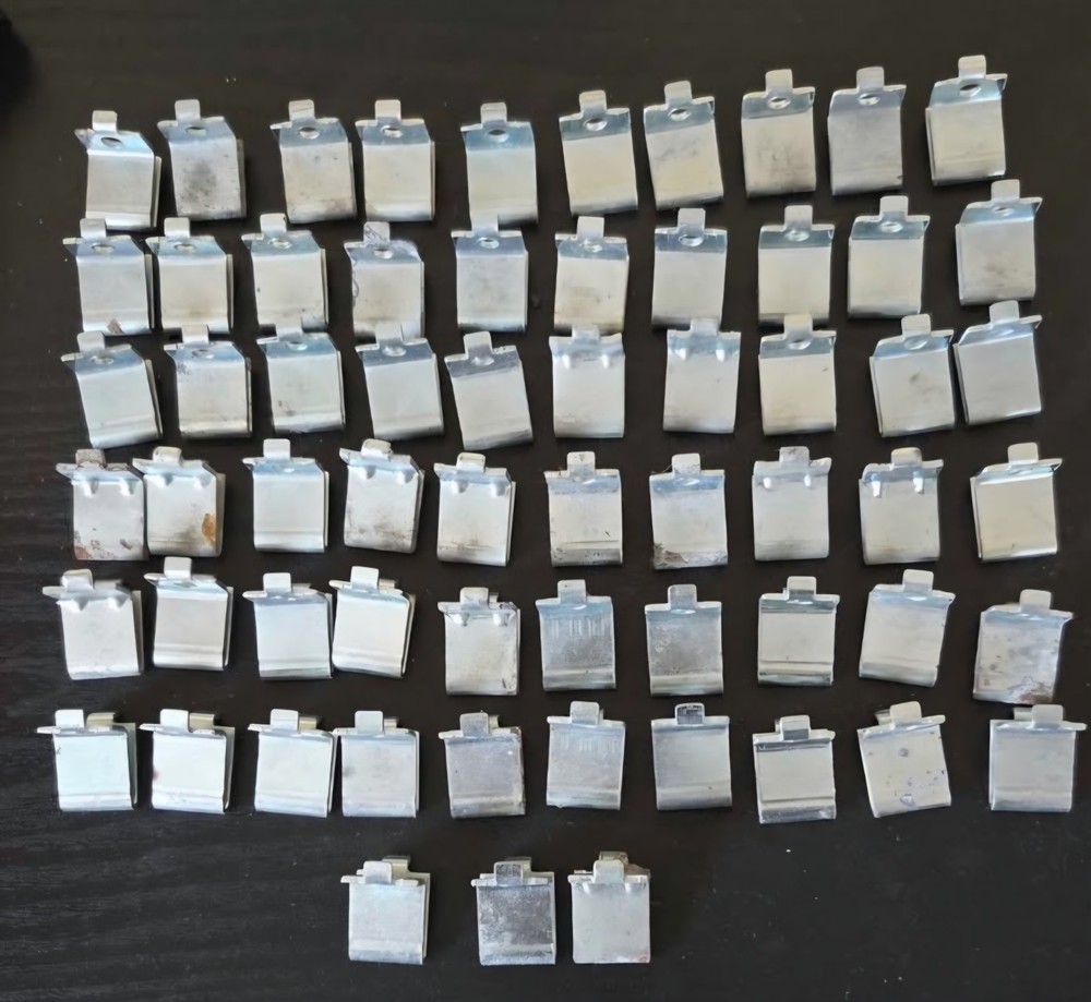 Pilaster Metal Shelf Clips. ( 63 Total )