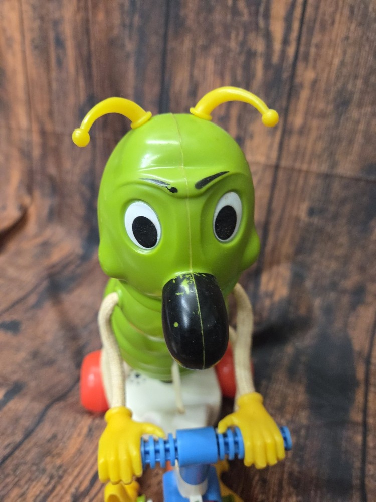 1967 Vintage Kusan “Cyclin' Sam” Bug Pull Toy