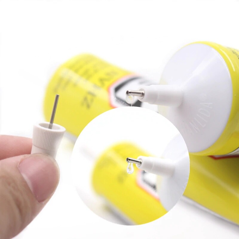 E-8000 Multipurpose High Performance Industrial Glue Semi Fluid Transparent