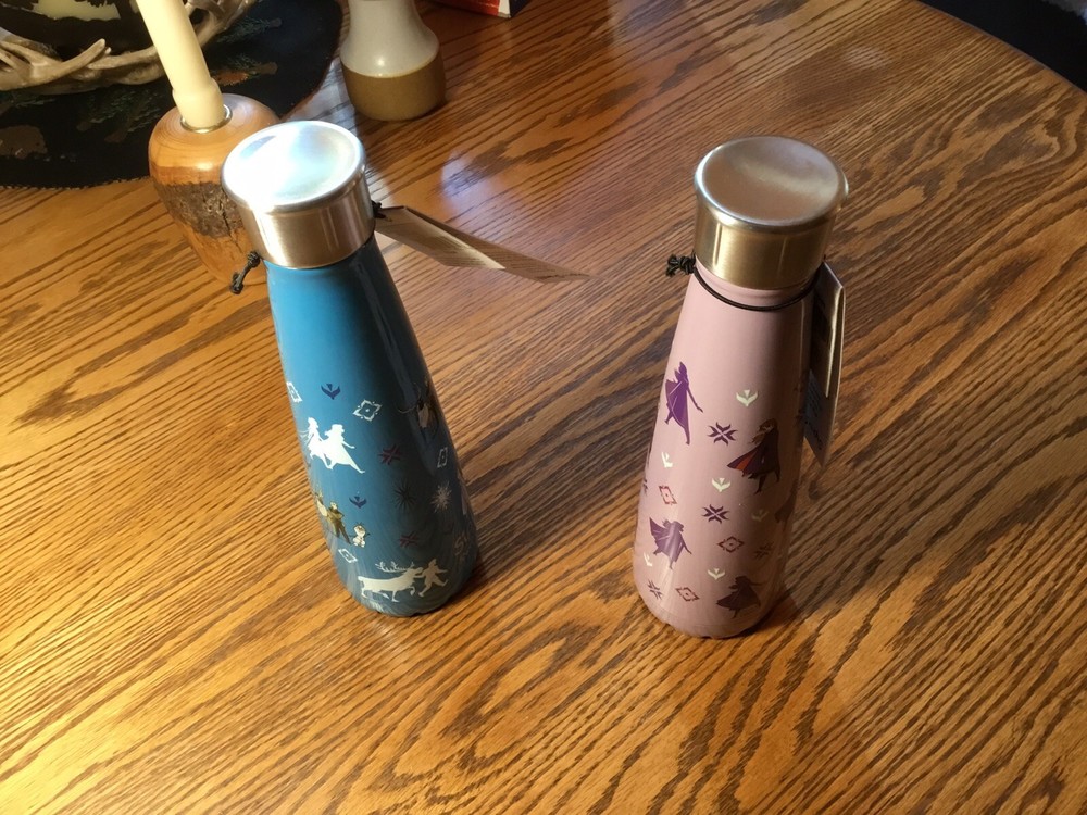 Two Swill brand Beverage Keepers