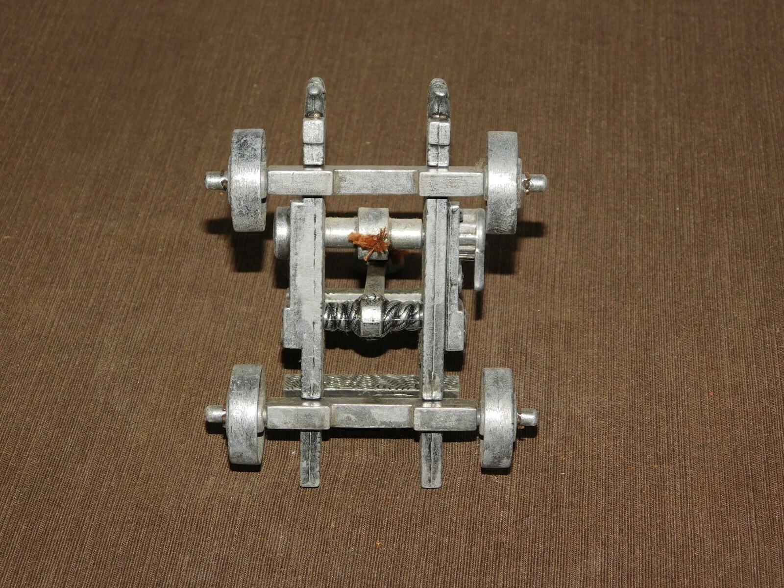 VINTAGE TOY 5" X 4" X 5 1/2" HIGH METAL CATAPULT