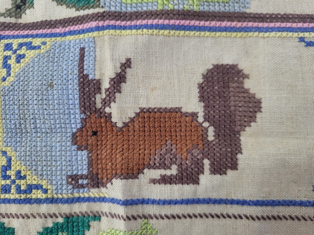 Vintage old embroidery educational Squirrel patterns different on fabric Ukraine