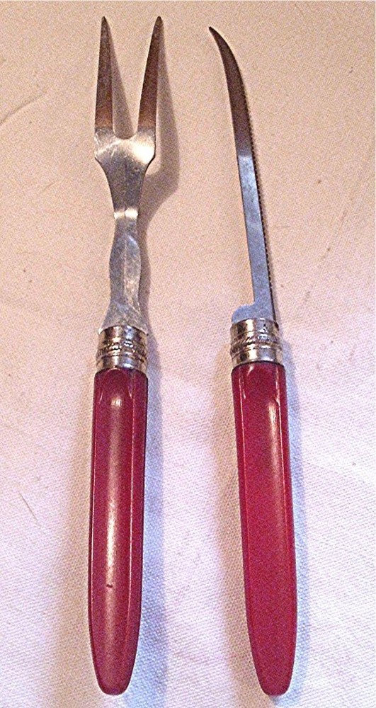 PAIR VTG BAKELITE RED RIBBED HANDLE MEAT FORK SERATED KNIFE