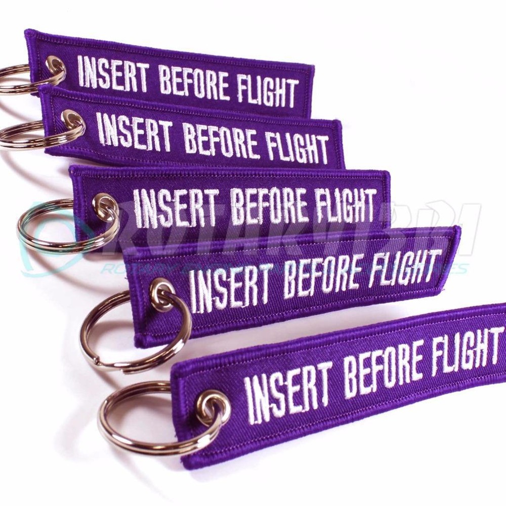 INSERT BEFORE FLIGHT KEYCHAIN PURPLE/white QTY = 5 PCS RING TAGS