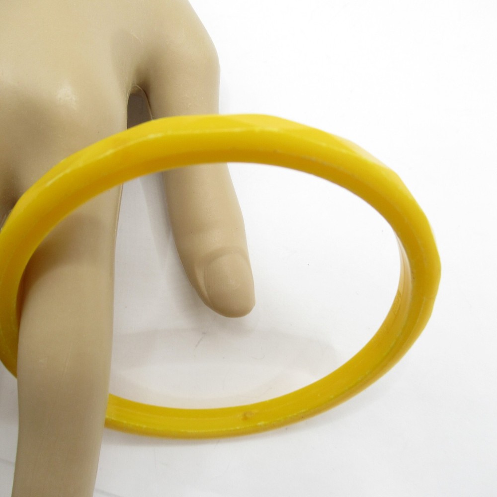 Gold Tone Thin Plastic Bangle Bracelet Multifaceted 'Diamond' Shape Exterior