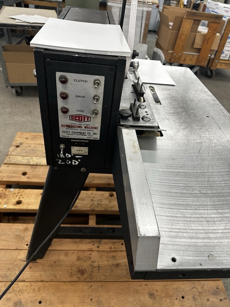 Scotty paper reinforcing Machine