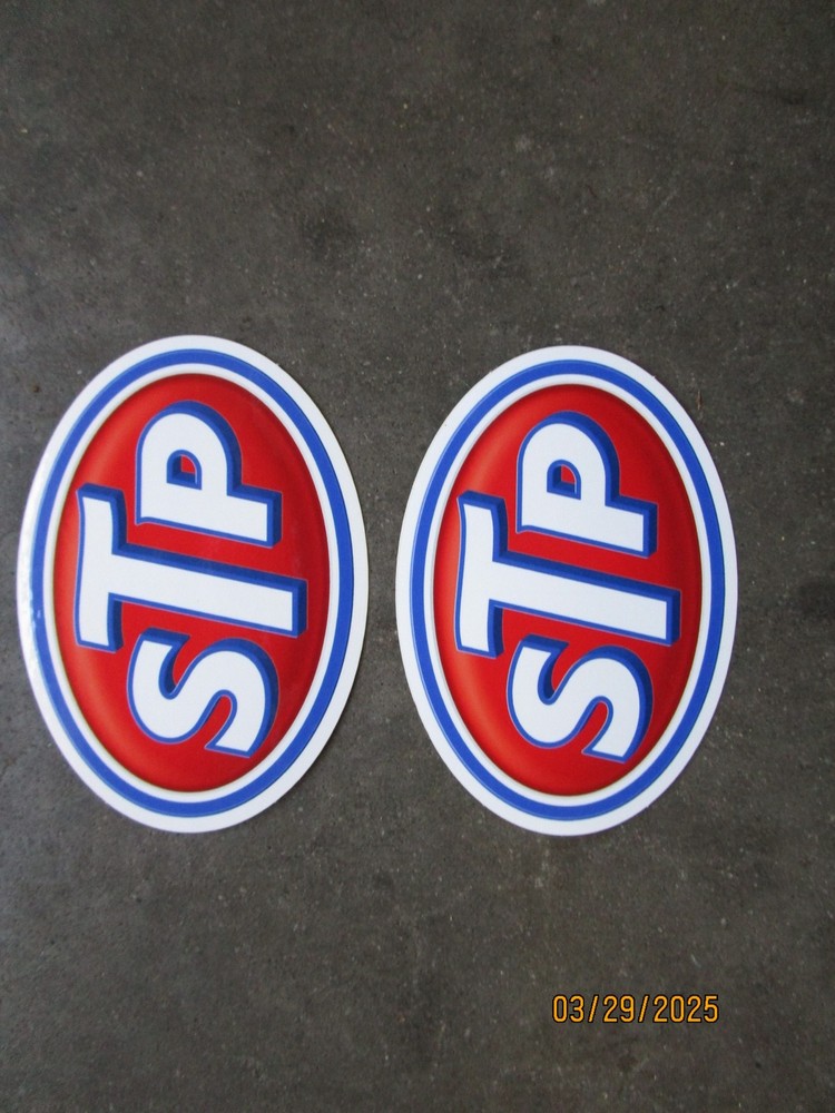 2 STP Oil Stickers 4"