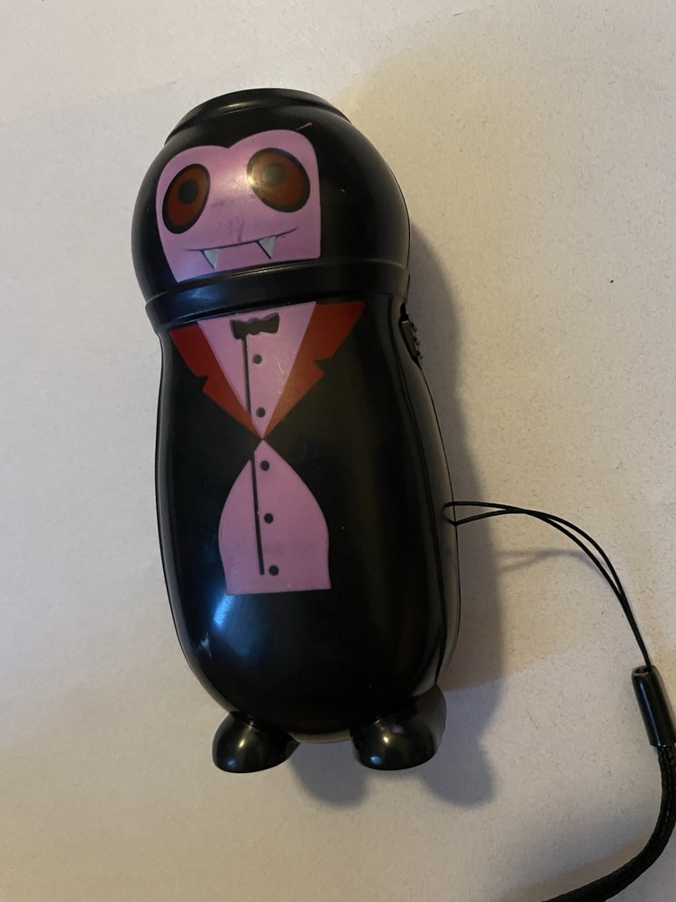 Dracula vampire toy flashlight works Walgreens Halloween spooky