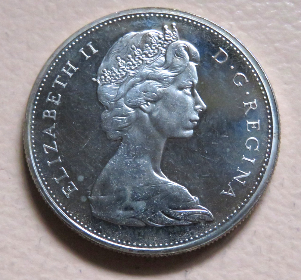 Canada. 1965 Silver - 1 Dollar.. small beads, blunt 5.. Prooflike BU