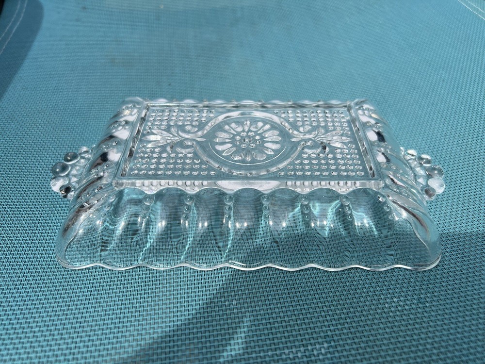 small rectangle shape crystal server with handles.  In good condition.