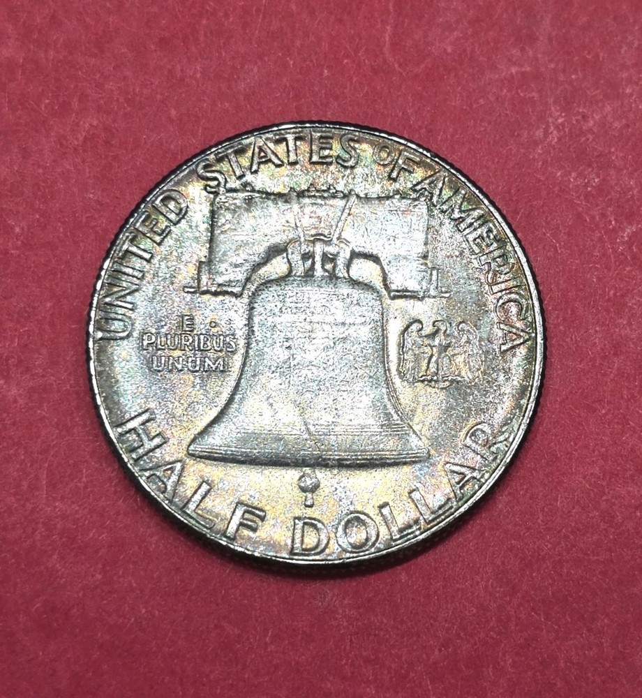 1957 Franklin Half Dollar Nicely Toned, Full Bell Lines.