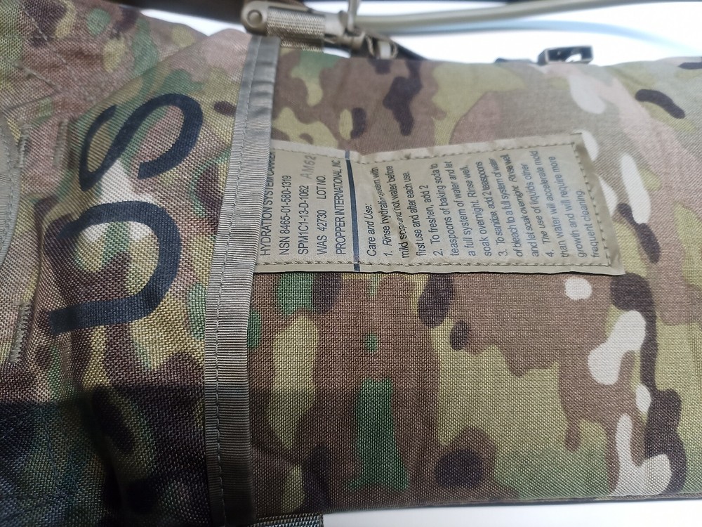 GENUINE US MULTI-CAMO HYDRATION BACKPACK SYSTEMS. PRE OWNED- USED UNITS.