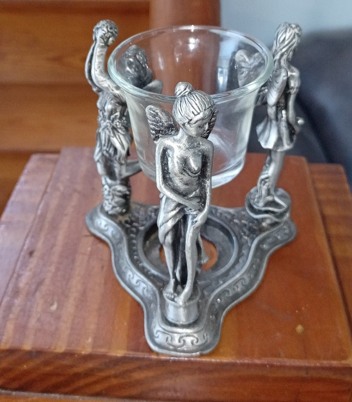 Metal 3 Character Pixie Tealight Holder.