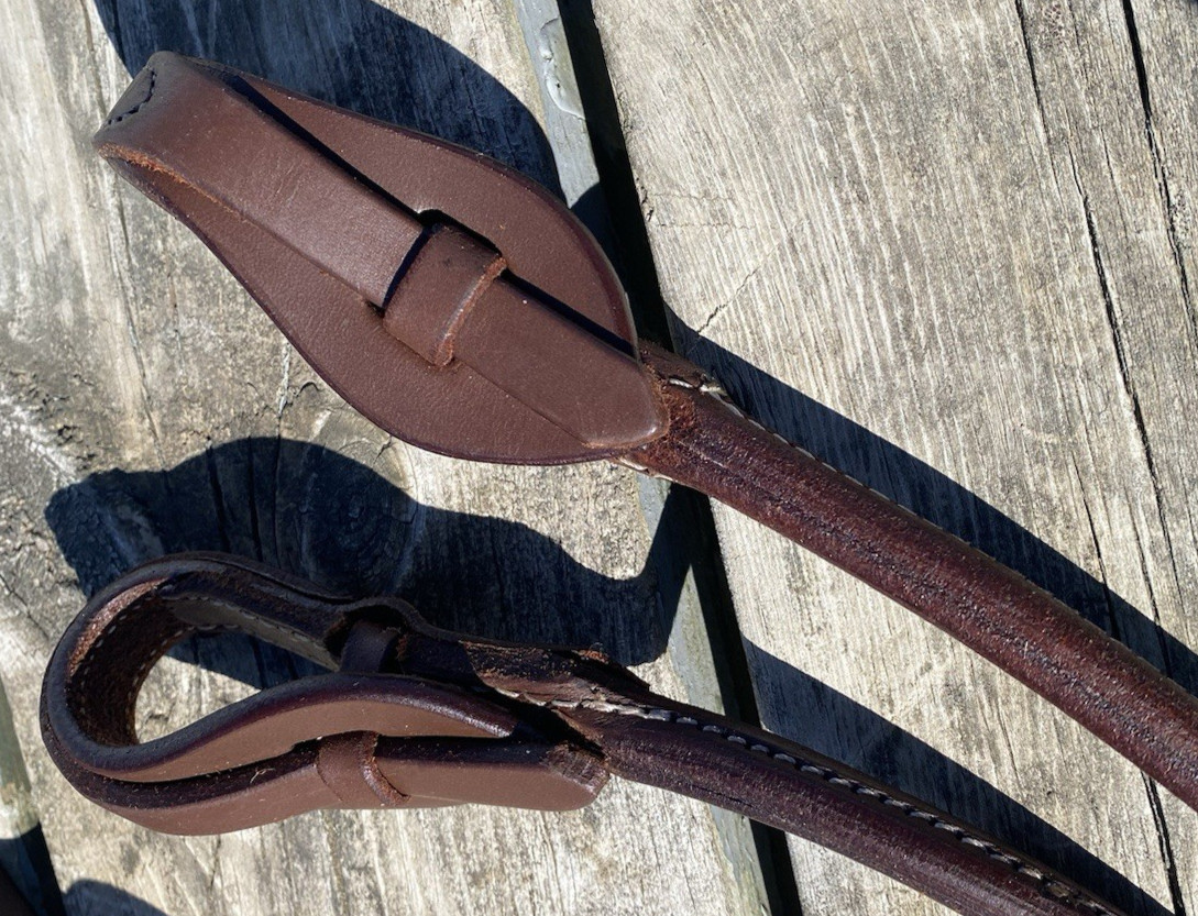 Rolled Argentine leather quick change Romel reins w/braided rawhide accents