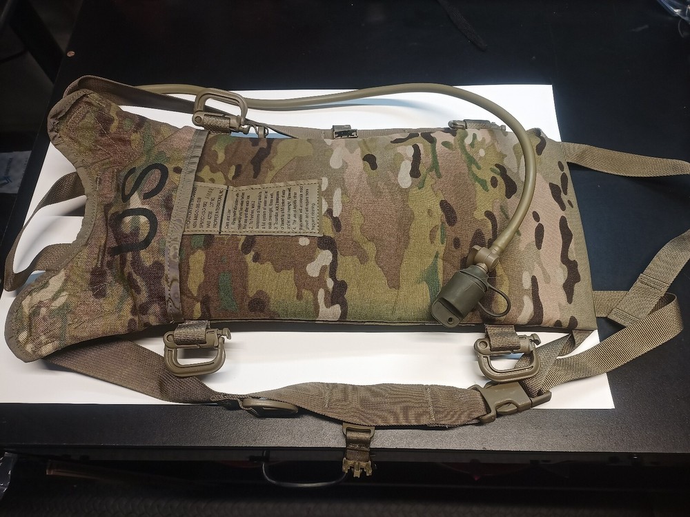 GENUINE US MULTI-CAMO HYDRATION BACKPACK SYSTEMS. PRE OWNED- USED UNITS.