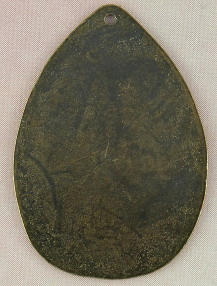 Antiqued brass hammered teardrops with hole.