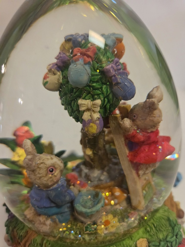 Springtime/Easter musical egg shaped glitter globe plays "Easter Parade"