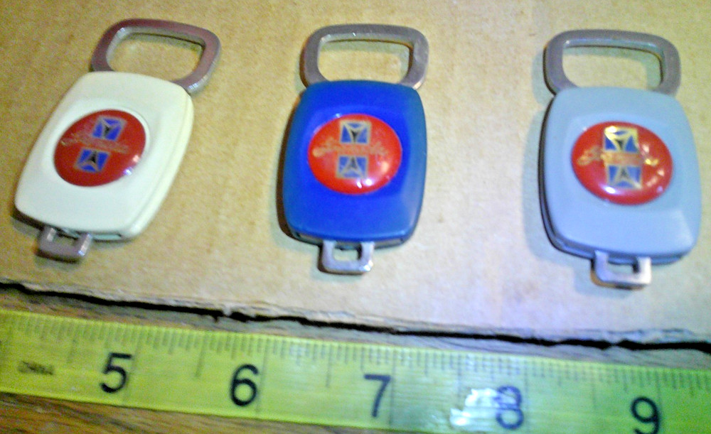 three original vintage auto keychains GRANADA ...........B