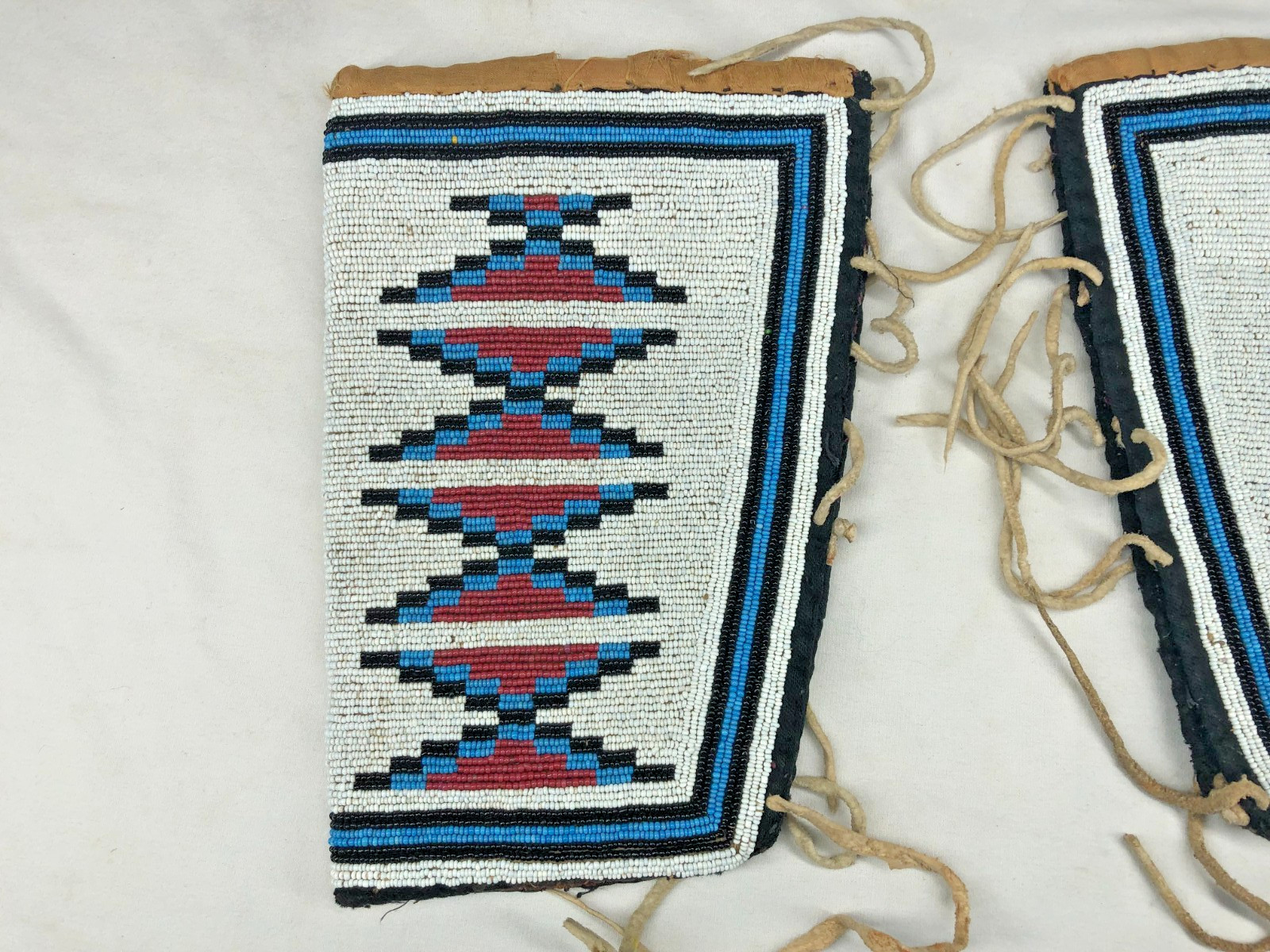 LATE 1800'S/EARLY 1900'S NATIVE AMERICAN MADE BEADED WRIST CUFFS W/ TRADE CLOTH