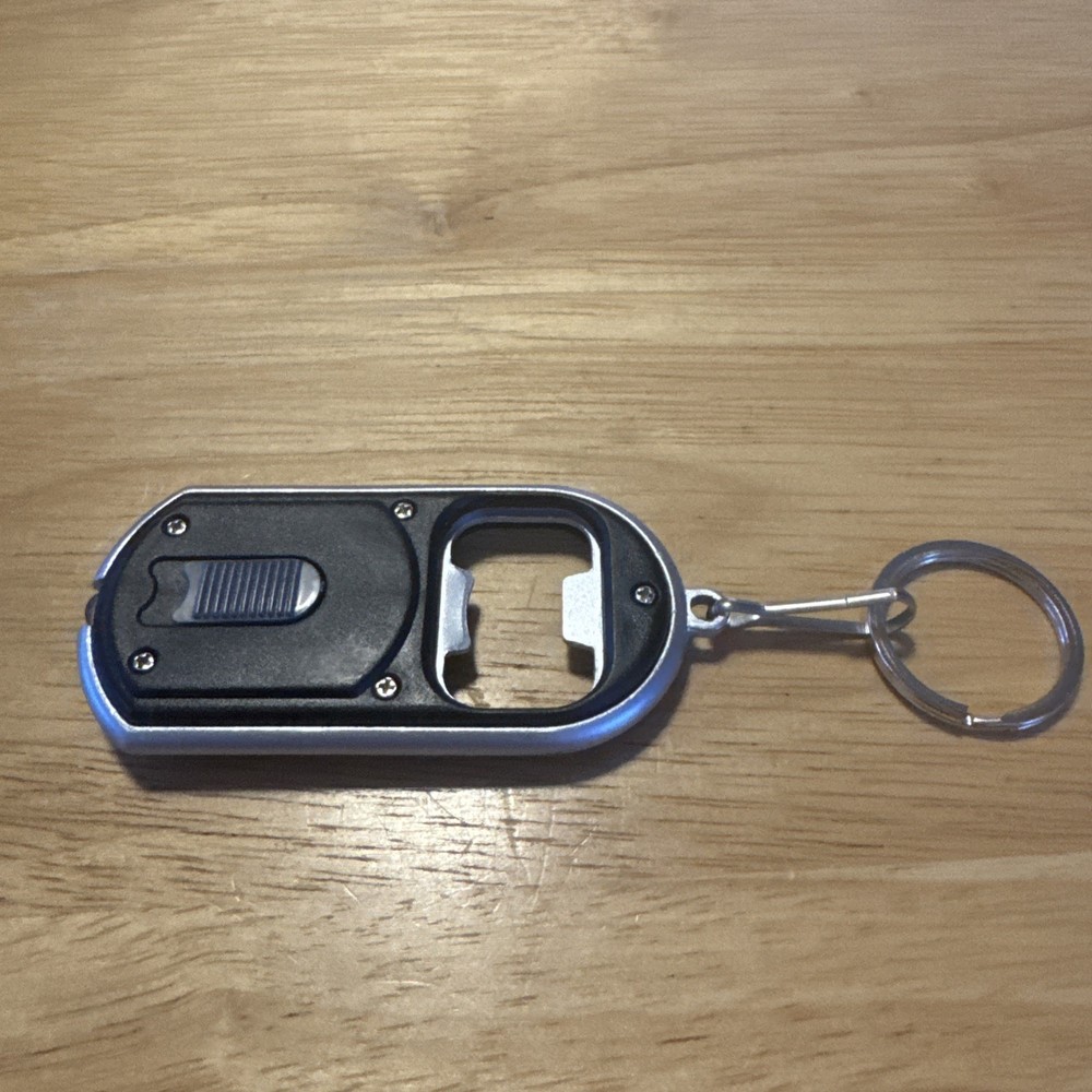 HMB Bottle Opener Keychain Flashlight works