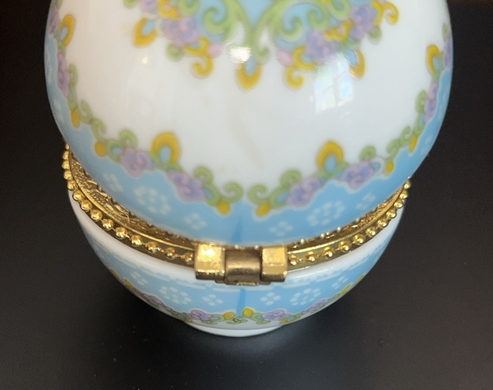 porcelain trinket box with brass clasp