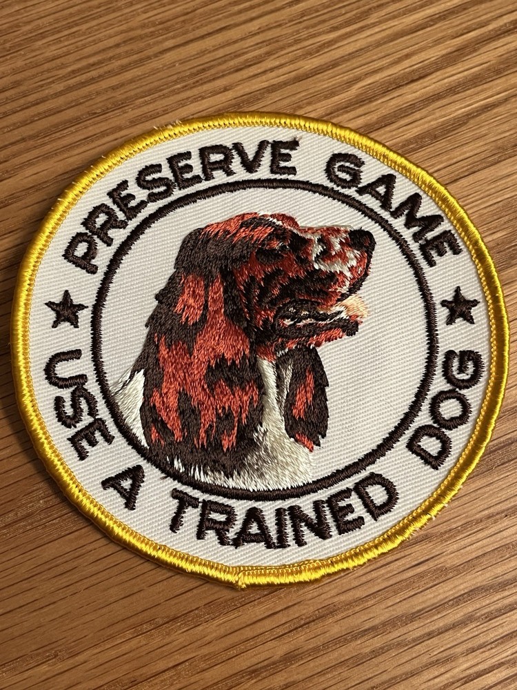 VINTAGE "PRESERVE GAME USE A TRAINED DOG” PATCH
