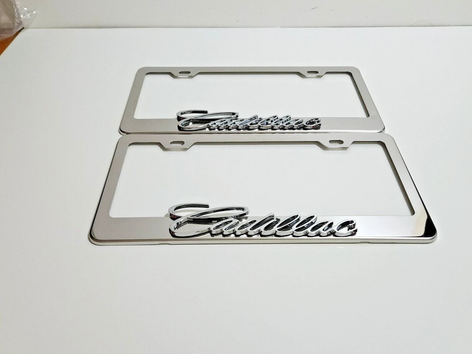 2 pcs Silver License Plate Frame for 3D Cadillac Logo