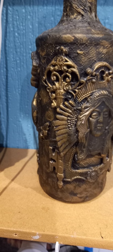 Empty decorative glass bottle number 62