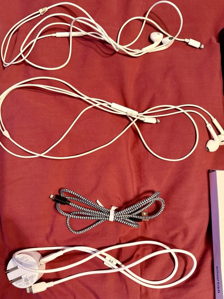 iphone lot: charger, 2 cords, 2 earbuds, case, and screen protector