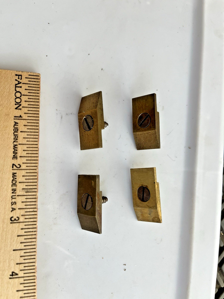 4 original E Howard large movement mounting brass clips