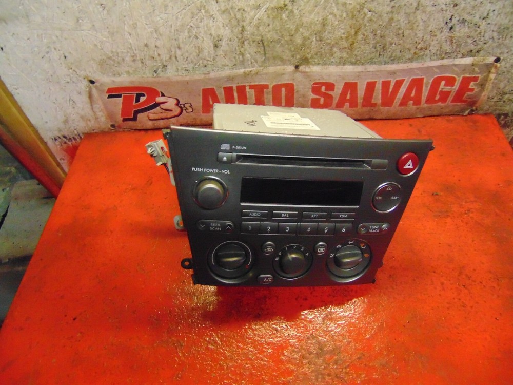06 05 Subaru Legacy outback cd player changer & climate control switch unit
