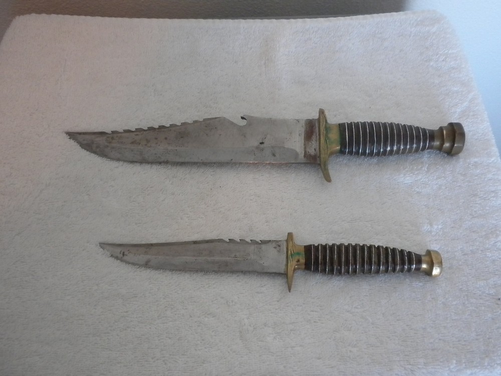 TWO KNIVES SAME DESIGN WITH LEATHER HOLDER