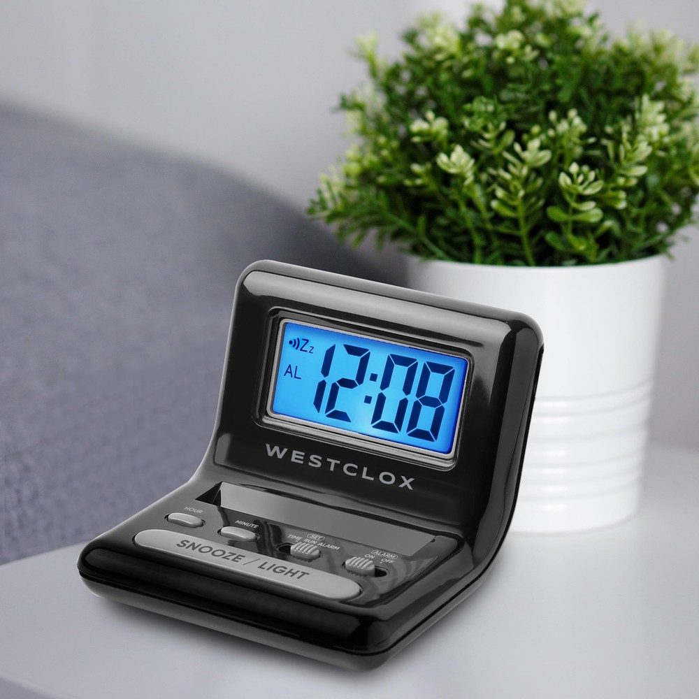 LCD Digital Bedside Alarm Clock with Blue Backlit Display and Snooze Function...