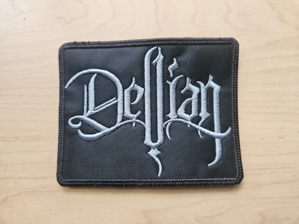 DEVIAN, SEW ON SILVER EMBROIDERED PATCH