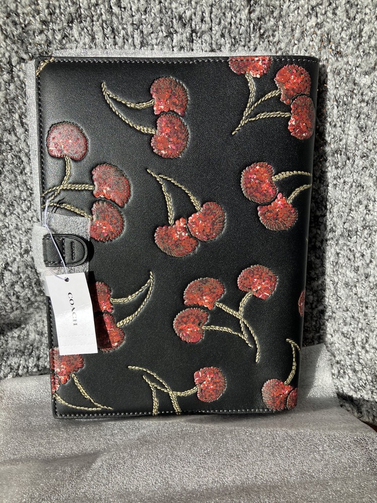 NWT Coach Notebook Cherry with gold/black multi 100% authentic. Purchased direct