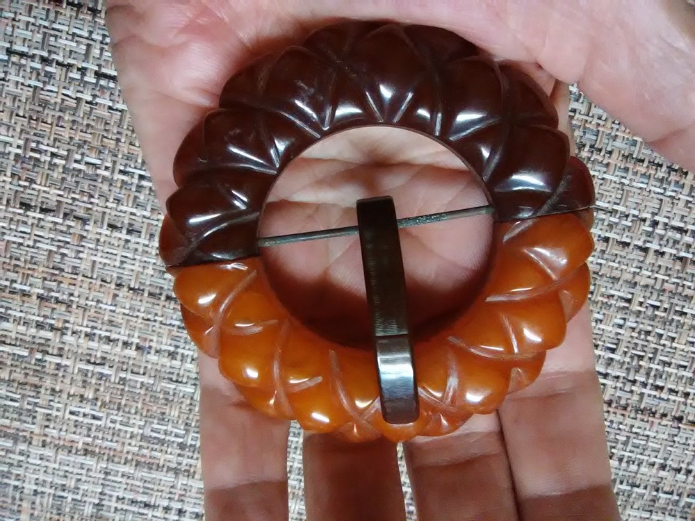 Carved Bakelite buckle