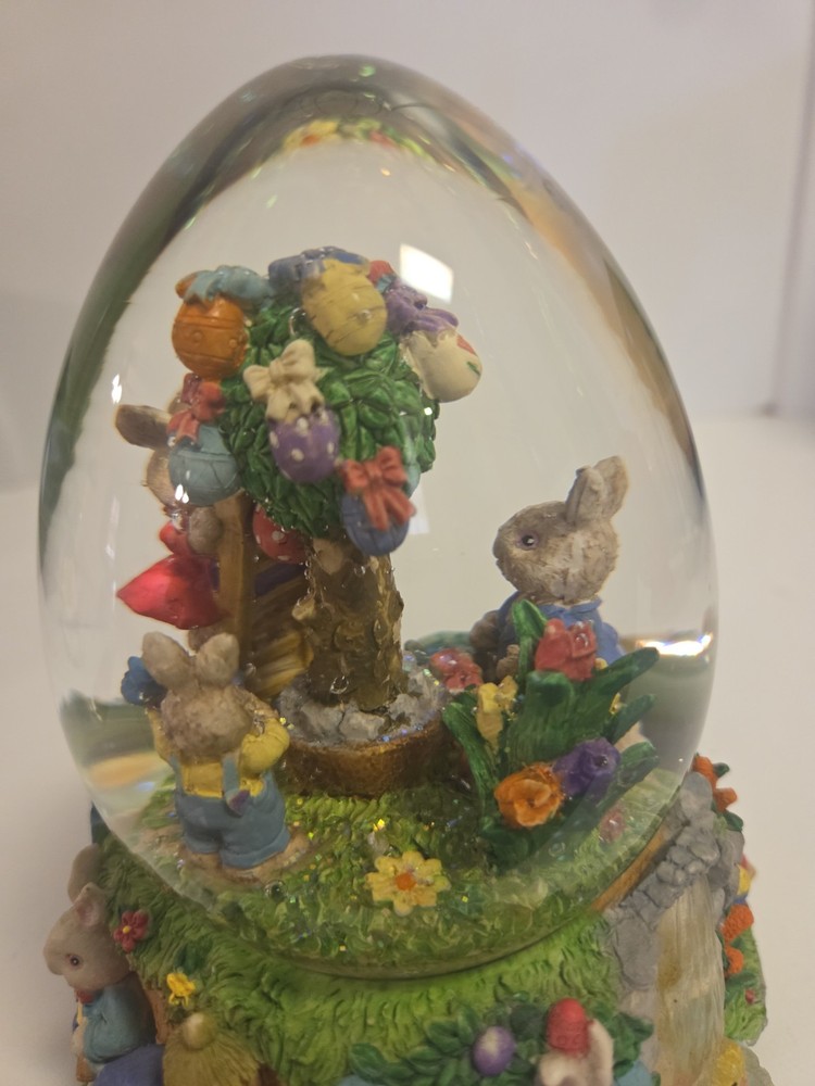 Springtime/Easter musical egg shaped glitter globe plays "Easter Parade"