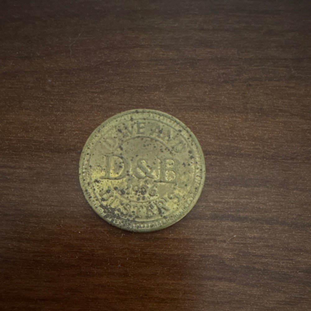 Dave & Buster's 1996 Brass Arcade Token Collectible