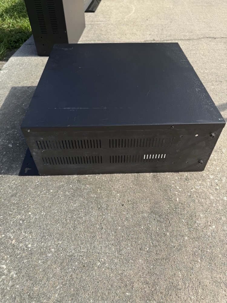 4RU vertical wall mount rack for network equipment and patch panels.