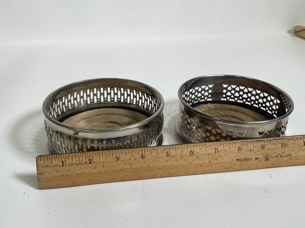 2 Silver Plated Bottle Caster Set Wood Base