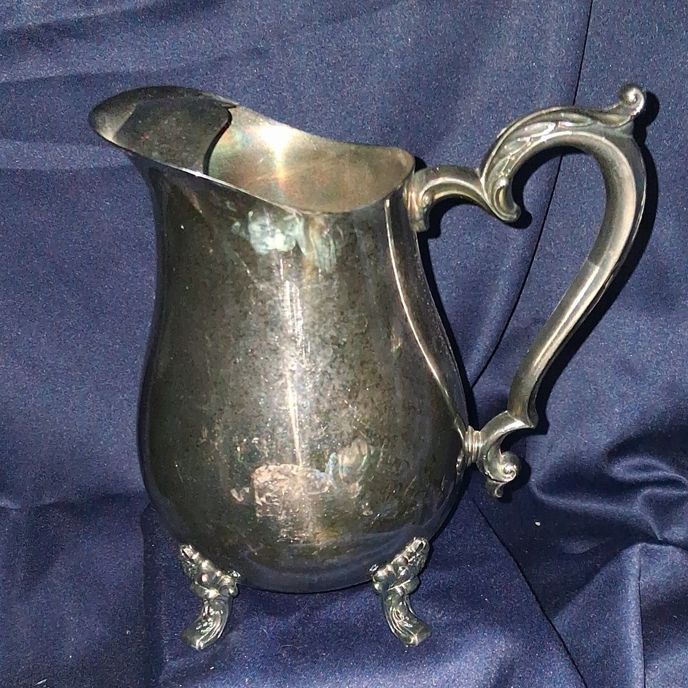 vintage Oneida silver-plated water pitcher.