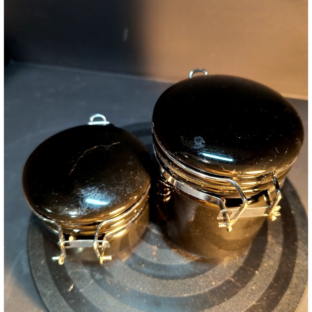 69. Set of 2 Black Ceramic Crocks