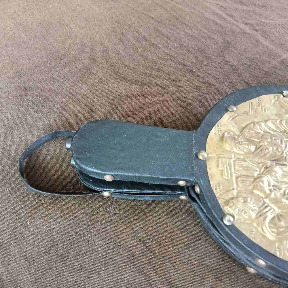 blacksmith's bellows or for lighting a barbecue or decoration