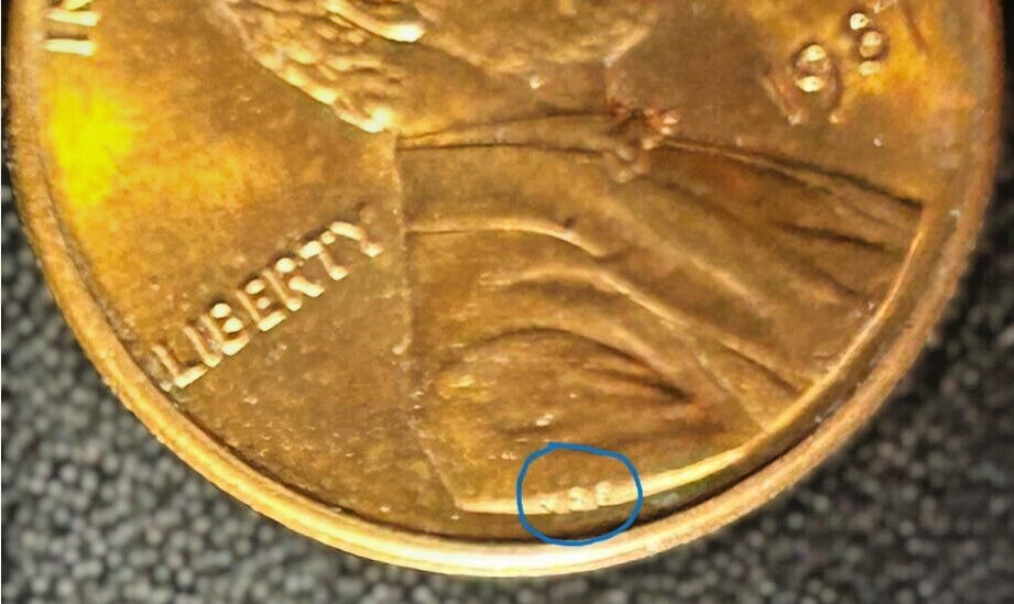 1987 Lincoln penny, no mint mark, visible VDB