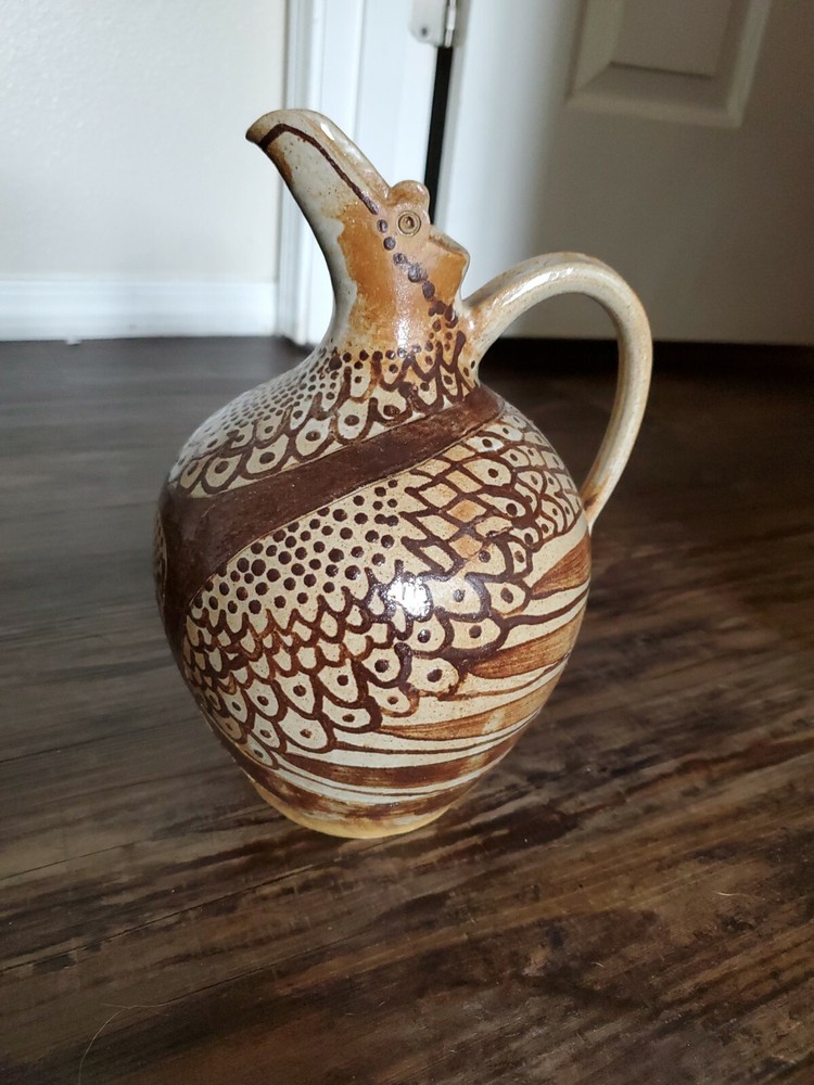 Amazing Pottery Pitcher Signed SF