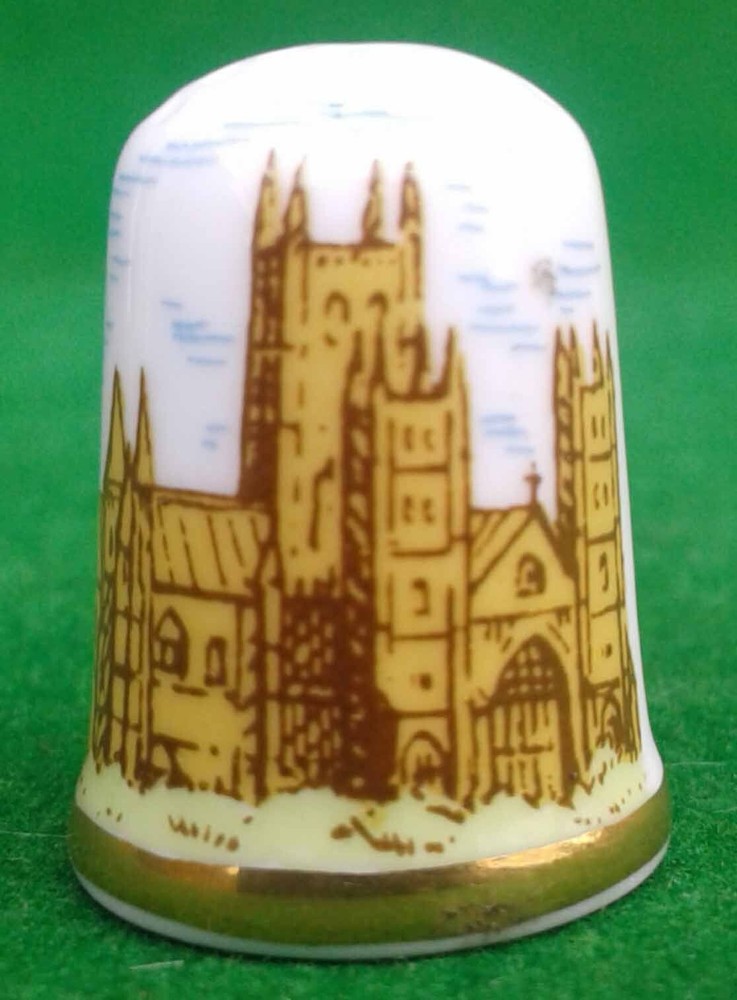 9 CAVERSWALL BONE CHINA THIMBLES.