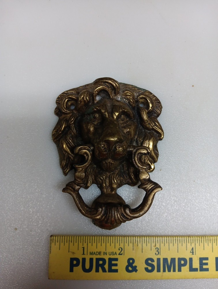 brass lion head door knocker