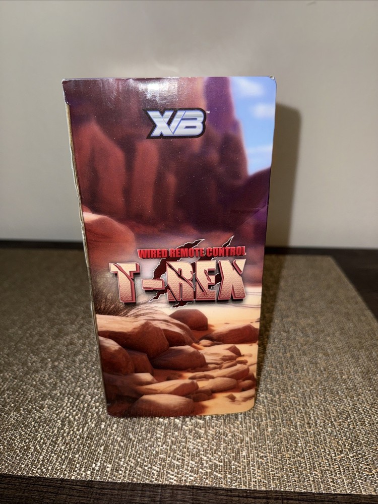 WIRED REMOTE CONTROL T-REX W/WIRED FOSSIL REMOTE CONTROL. NEW